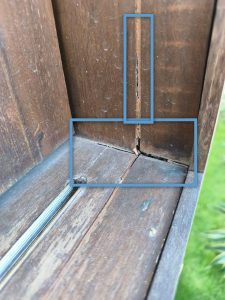 weathered door frame cracks